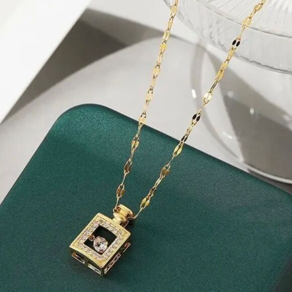 Gold Perfume Bottle with Dancing Diamond In Motion - Picture 3 of 3